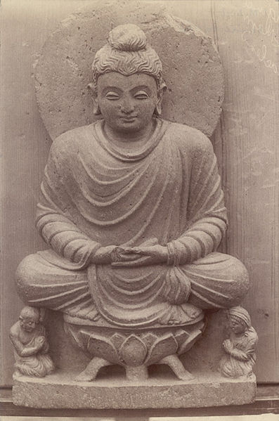 Buddha statue on a lotus throne.